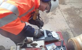 Heather Raymond installing guages for a pneumatic actuator onsite (002).jpg